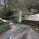 Water measure sign next to a ford crossing
